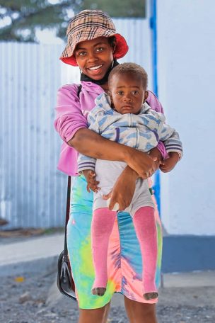 Mum hugs child after completing clubfoot tenotomy treatment CCK Clubfoot Care for Kenya Hope Walks Programme Treating Clubfoot-2